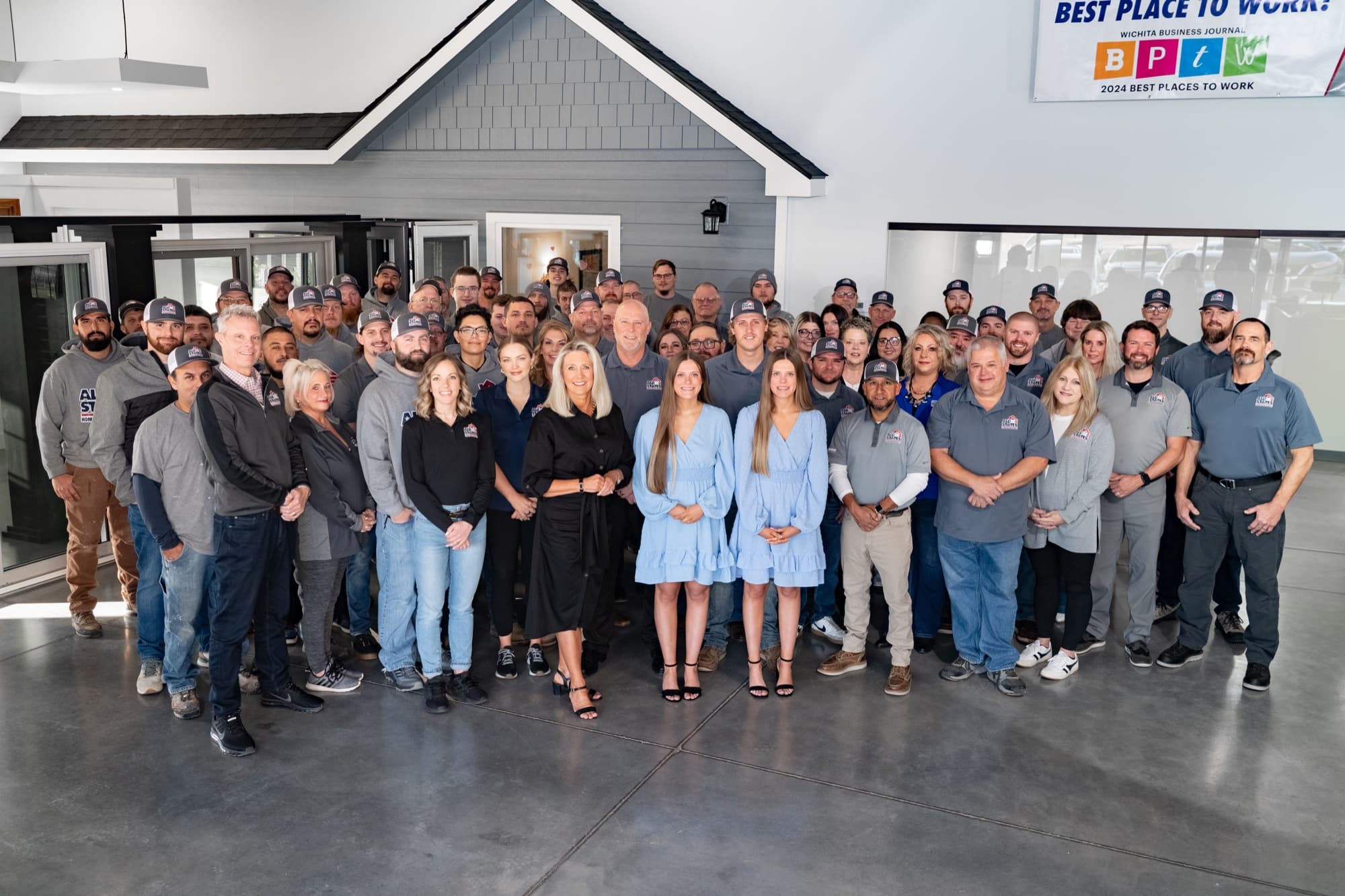 All States Home Improvement staff in coordinated company apparel