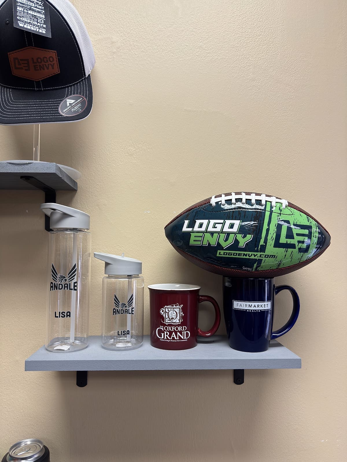 Promo spread, leather-patch caps, mugs, bottles & custom footballs