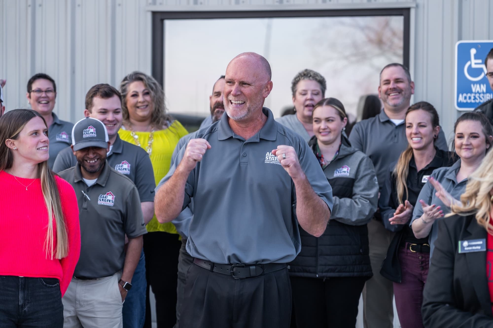 All States Home Improvement staff gathered in branded apparel